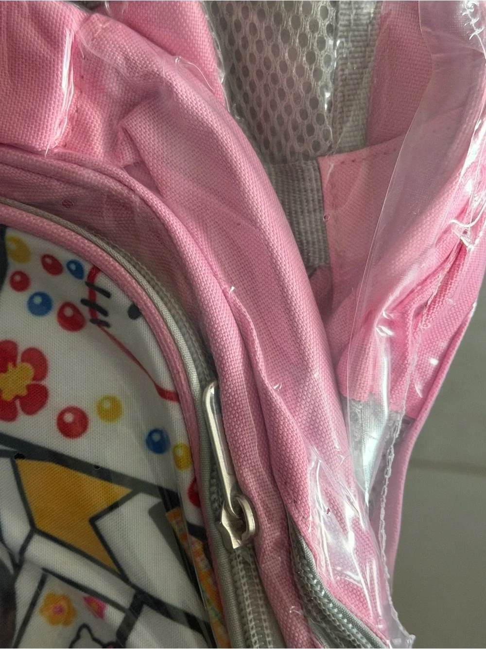 NEDISP Hello Kitty White Comic Collage Kids BOOKSACK with Pink/Gray Trim